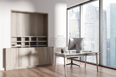 Photo for White office corner interior with desk and pc computer, side view. Wooden shelf with decoration and panoramic window on Singapore skyscrapers. 3D rendering - Royalty Free Image