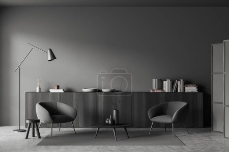 Téléchargez les photos : Salon sombre intérieur avec deux fauteuils, tabouret et commode avec décoration d'art, lampe et tapis sur sol en béton gris. Mur d'espace de copie de maquette, rendu 3D - en image libre de droit