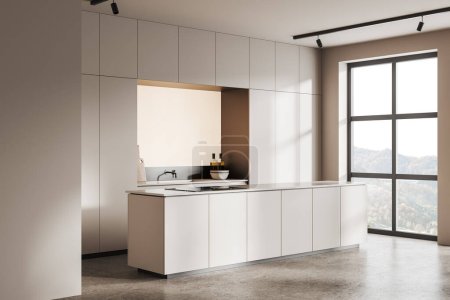 Photo for Corner view of cozy hotel kitchen interior with bar island, grey concrete floor. Minimalist cooking area with cabinet and kitchenware, panoramic window on countryside. 3D rendering - Royalty Free Image