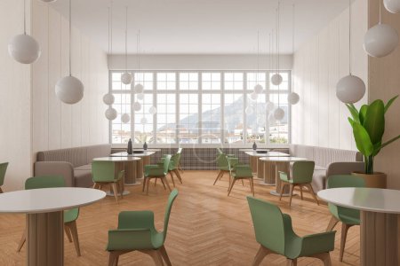 Foto de Interior de la cafetería moderna con paredes blancas y de madera, suelo de madera, cómodas mesas redondas y ovaladas con sillas verdes y sofás grises suaves. renderizado 3d - Imagen libre de derechos
