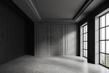 Foto de Clásico interior del hotel vacío con suelo de hormigón gris, sala de estar con madera negra y pared de moldeo. Ventana panorámica en el campo. Sin muebles, sin gente. Renderizado 3D - Imagen libre de derechos