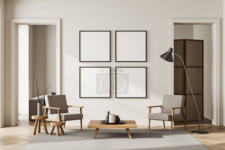 Foto de Moderna habitación beige relajante interior dos sillones y mesa de centro en la alfombra, piso de madera. Cuatro carteles de lona simulados. Renderizado 3D - Imagen libre de derechos
