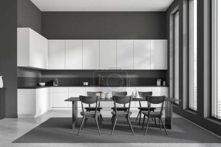 Photo for Black and white kitchen interior with chairs and dining table on carpet, grey concrete floor. Cooking zone with kitchenware and panoramic window on city view. 3D rendering - Royalty Free Image