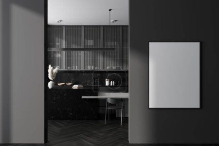 Foto de Interior de la cocina oscura con bar isla, mesa y sillas en el suelo de madera negra. Menaje de cocina minimalista en zona de cocción. Cartel burlón antes de la entrada. Renderizado 3D - Imagen libre de derechos