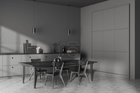 Téléchargez les photos : Intérieur de cuisine sombre avec table et chaises, vue latérale sol en béton gris. Coin cuisine et salle à manger avec ustensiles de cuisine minimalistes. rendu 3D - en image libre de droit