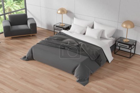 Photo for Top view of modern bedroom interior with white walls, wooden floor, comfortable king size bed and cozy gray armchair standing near window. 3d rendering - Royalty Free Image