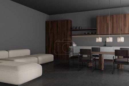 Photo for Dark studio interior with relaxing and cooking zone, sofa and dining table with chairs. Wooden shelves and minimalist kitchenware, grey concrete floor. 3D rendering - Royalty Free Image