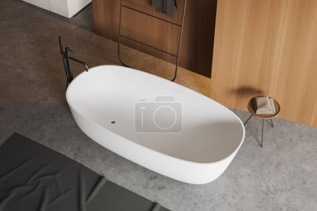 Photo for Top view of modern bathroom interior with bathtub and carpet on grey concrete floor. Bathing area with stool and towel rail ladder. 3D rendering - Royalty Free Image