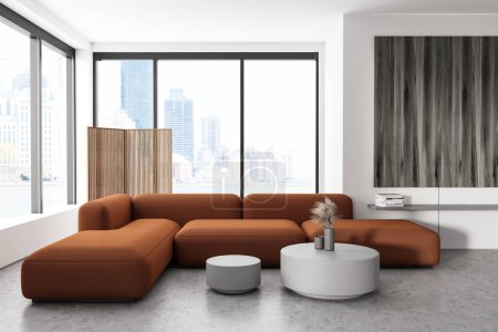 Photo for White living room interior with sofa and coffee table with decor, grey concrete floor. Shelf with books and panoramic window on skyscrapers. 3D rendering - Royalty Free Image