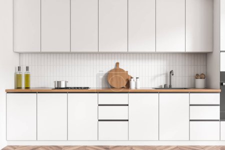 Foto de Interior de la cocina blanca con fregadero y estufa, menaje de cocina minimalista en la cubierta. Espacio de cocina con diseño oculto en suelo de madera. Renderizado 3D - Imagen libre de derechos