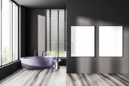 Photo for Front view on dark bathroom interior with bathtub, two empty white posters, panoramic window with countryside view, grey walls, stool with towels and shampoo, oak wooden floor. Mock up. 3d rendering - Royalty Free Image