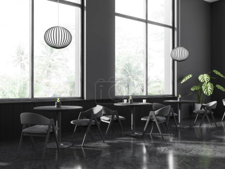 Téléchargez les photos : Coin de café élégant avec des murs gris et en bois, sol en pierre, tables rondes avec chaises grises et fenêtres avec vue tropicale. Rendu 3d - en image libre de droit