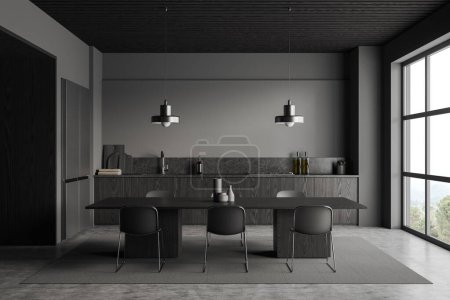 Photo for Dark home kitchen interior with eating space, chairs and fridge with kitchenware, panoramic window on countryside. Modern cooking and dining area, carpet on grey concrete floor. 3D rendering - Royalty Free Image