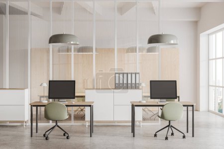 Foto de Interior de la moderna oficina de espacio abierto con paredes blancas y de vidrio, suelo de hormigón, escritorios de ordenador compactos con sillas verdes y gabinete blanco con carpetas. renderizado 3d - Imagen libre de derechos