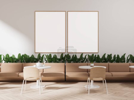 Photo for Interior of modern cafeteria with white walls, wooden floor, comfortable beige sofas standing near round tables with chairs and flower beds with two vertical mock up posters above them. 3d rendering - Royalty Free Image