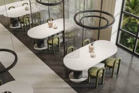 Foto de Vista superior del interior de la cafetería con sillas verdes y mesa blanca en fila, suelo de hormigón. Elegante restaurante comedor con mampara de cristal y ventana panorámica. Renderizado 3D - Imagen libre de derechos