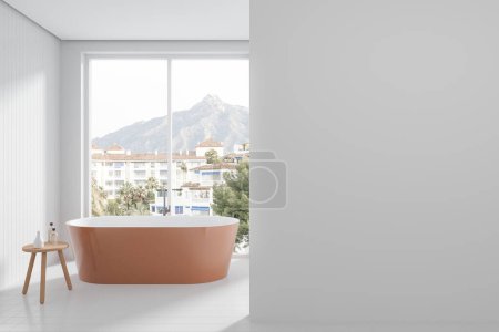 Foto de Interior de baño moderno con paredes de baldosas blancas y suelo, cómoda bañera naranja de pie cerca de una gran ventana y la pared de espacio de copia a la derecha. renderizado 3d - Imagen libre de derechos
