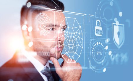 Photo for Serious handsome businessman touching chin with facial recognition by digital interface with robot hologram, padlock, finger print, pie diagram. Concept of modern technology of artificial intelligence - Royalty Free Image