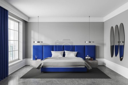 Photo for Blue and white hotel bedroom interior bed and nightstand with mirror, carpet on concrete floor. Panoramic window on skyscrapers. Mock up empty wall. 3D rendering - Royalty Free Image
