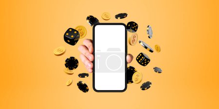 Photo for Hand of man holding smartphone with mock up screen and dice, poker chips and dollar coins over yellow background. Concept of online casino and success - Royalty Free Image