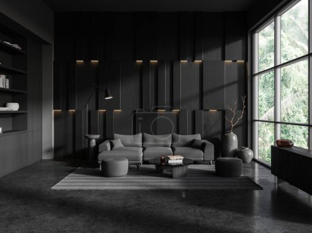 Foto de Interior de la elegante sala de estar con paredes grises y de madera, suelo de hormigón, cómodo sofá gris de pie cerca de la mesa redonda y ventana panorámica. renderizado 3d - Imagen libre de derechos