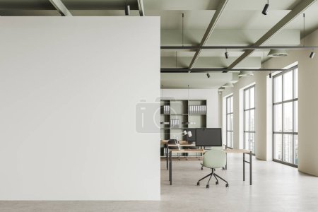 Photo for Cozy coworking interior with pc desktop on table in row, armchairs on light concrete floor. Shelf and panoramic window on skyscrapers. Mock up copy space partition. 3D rendering - Royalty Free Image