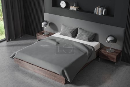 Photo for Interior of stylish bedroom with gray walls, concrete floor, comfortable king size bed with gray cover and two dark wooden nightstands with lamps on them. 3d rendering - Royalty Free Image