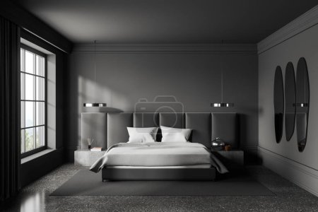 Foto de Dormitorio oscuro cama interior y mesita de noche con espejo, alfombra en piso de hormigón gris. Ventana panorámica en el campo. Prepara la pared vacía. Renderizado 3D - Imagen libre de derechos