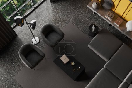 Photo for Top view of dark home living room interior with two armchairs and couch, coffee table and stone bench with art decoration and books, panoramic window and grey concrete floor. 3D rendering - Royalty Free Image