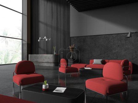 Foto de Vista de esquina del vestíbulo interior de la oficina con zona de salón, sillones rojos y sofá con mesa de café. Espacio de espera y recepción cerca de la ventana panorámica en los trópicos. Renderizado 3D - Imagen libre de derechos