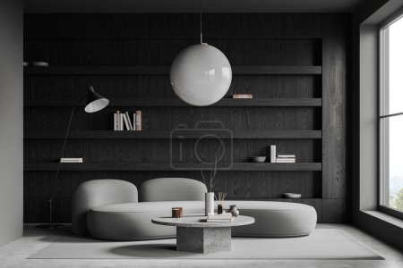 Photo for Interior of stylish living room with gray walls, concrete floor, comfortable gray couch standing near round coffee table and dark wooden bookcase. 3d rendering - Royalty Free Image
