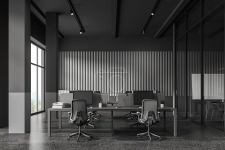 Foto de Interior de elegante oficina de espacio abierto con paredes grises y grises oscuros, piso de hormigón, filas de mesas de ordenador con sillas grises y columnas. renderizado 3d - Imagen libre de derechos