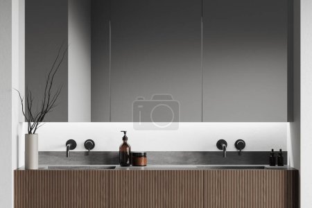 Téléchargez les photos : Élégant intérieur de salle de bain avec double lavabo et vanité en bois avec décoration et accessoires minimalistes. Deux lavabos et miroir sur mur blanc, gros plan. rendu 3D - en image libre de droit