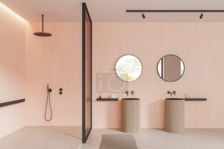 Téléchargez les photos : Intérieur de salle de bain moderne avec murs beige et blanc, sol en béton, douche à l'italienne avec porte vitrée et confortable lavabo double avec deux miroirs ronds. Rendu 3d - en image libre de droit
