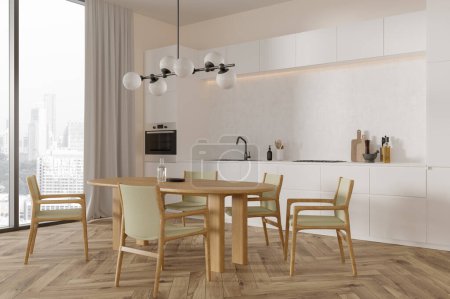 Téléchargez les photos : Coin de cuisine moderne avec murs blancs, plancher en bois, placards blancs confortables et armoires avec évier intégré et table à manger confortable avec chaises vertes. Rendu 3d - en image libre de droit
