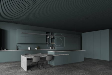 Photo for Dark green kitchen interior with stone table and bar counter, side view long cabinet on grey granite floor. Stylish dining and cooking space in luxury apartment. 3D rendering - Royalty Free Image