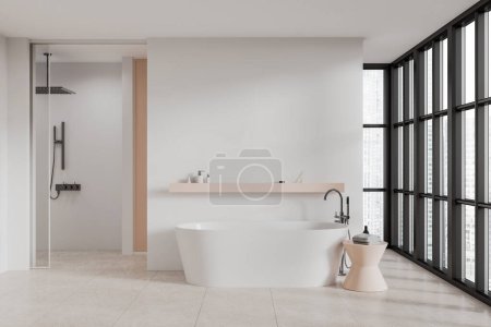 Téléchargez les photos : Intérieur de salle de bain moderne avec murs blancs, sol carrelé, douche à l'italienne et baignoire blanche confortable debout près de la grande fenêtre. Rendu 3d - en image libre de droit