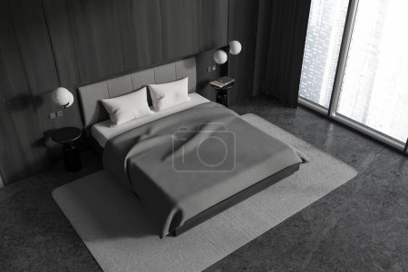 Photo for Top view of home bedroom interior with bed and nightstand with decoration, carpet on grey granite floor. Relax corner with panoramic window on skyscrapers. 3D rendering - Royalty Free Image