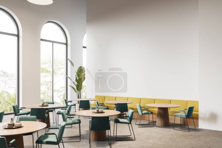 Photo for White cafeteria interior with green chairs and round table, side view beige granite floor. Yellow sofa and plant, panoramic arch window on tropics. Mock up copy space wall. 3D rendering - Royalty Free Image