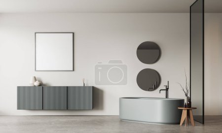 Foto de Interior de baño moderno con paredes blancas, suelo de hormigón, cómoda bañera gris, dos espejos redondos y elegante vestidor con cartelera cuadrada simulada colgando encima. renderizado 3d - Imagen libre de derechos