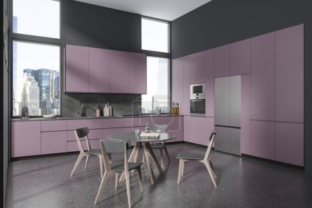 Photo for Corner of stylish kitchen with gray walls, comfortable purple cupboards and cabinets with built in cooker, sink and oven, big fridge and round dining table with gray chairs. 3d rendering - Royalty Free Image