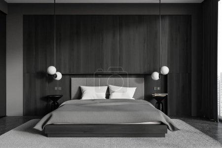 Foto de Interior del dormitorio del hotel oscuro con cama y mesita de noche con libros y decoración, alfombra en piso de granito gris. Relájese espacio con ventana panorámica en los rascacielos. Renderizado 3D - Imagen libre de derechos