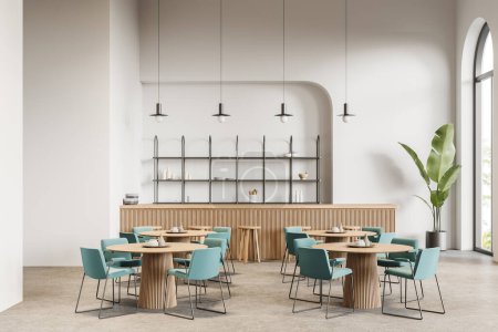 Foto de Interior de la cafetería moderna con paredes blancas, suelo de hormigón, cómodo mostrador de bar de madera con taburetes, mesas redondas con sillas azules y ventanas arqueadas. renderizado 3d - Imagen libre de derechos