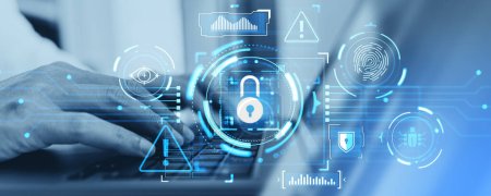 Photo for Developer hands typing on laptop in blurry office with double exposure of immersive padlock cybersecurity interface and computer virus alert icons. Data protection concept - Royalty Free Image