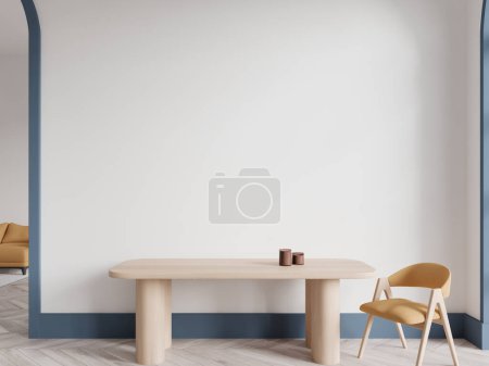 Foto de Salón interior blanco con sillón y mesa de madera con vela, espacio para reuniones o comidas con muebles minimalistas. Mockup copia espacio vacío pared blanca. Renderizado 3D - Imagen libre de derechos