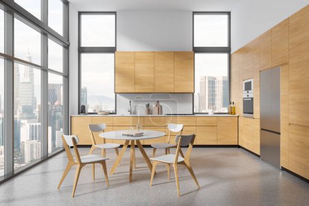 Foto de Casa blanca interior de la cocina con mesa y armario, utensilios de cocina y horno con refrigerador montado. Ventana panorámica de los rascacielos Kuala Lumpur. Renderizado 3D - Imagen libre de derechos