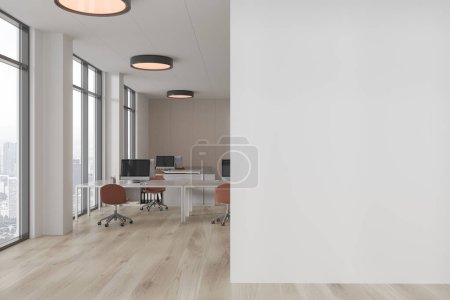 Photo for Interior of stylish open space office with white and wooden walls, wooden floor, white computer tables with brown chairs and copy space wall on the right. 3d rendering - Royalty Free Image