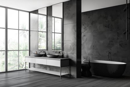 Photo for Corner of stylish bathroom with gray marble walls, dark wooden floor, comfortable gray bathtub and double sink with two vertical mirrors standing on white cabinet. 3d rendering - Royalty Free Image