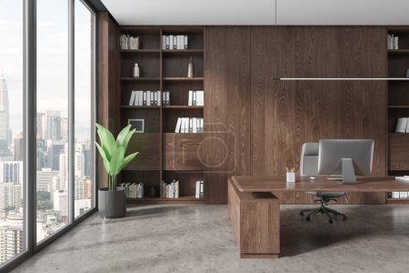 Foto de Interior de la elegante oficina CEO con paredes de madera, piso de hormigón, cómoda mesa de madera y librería con carpetas de pie cerca de la ventana panorámica con paisaje urbano. renderizado 3d - Imagen libre de derechos