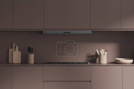 Téléchargez les photos : Élégant intérieur de cuisine maison avec cuisinière et hotte, planche à découper, couteaux, cuillère et assiette sur le comptoir. Espace de cuisson dans un nouvel appartement moderne. rendu 3D - en image libre de droit